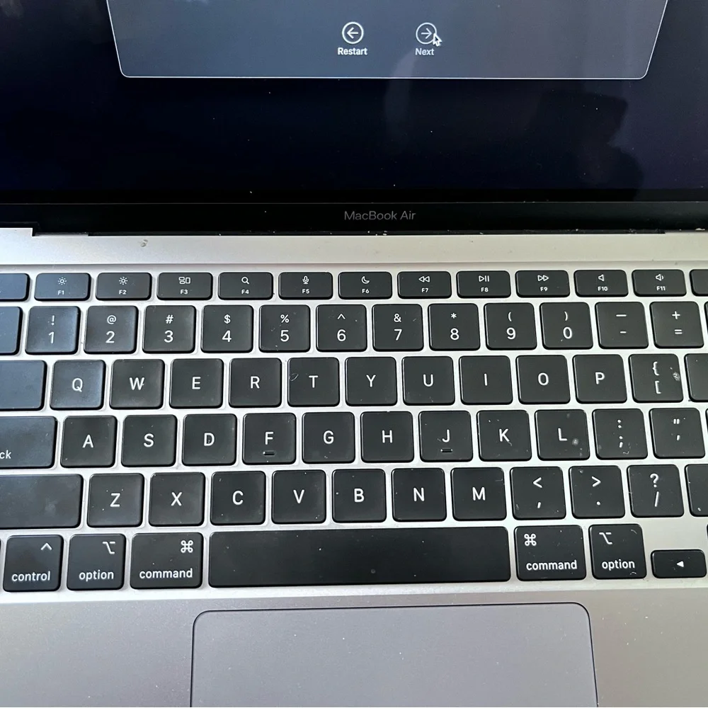 Apple Silver Laptop with Modern Slim Design and Vibrant Display